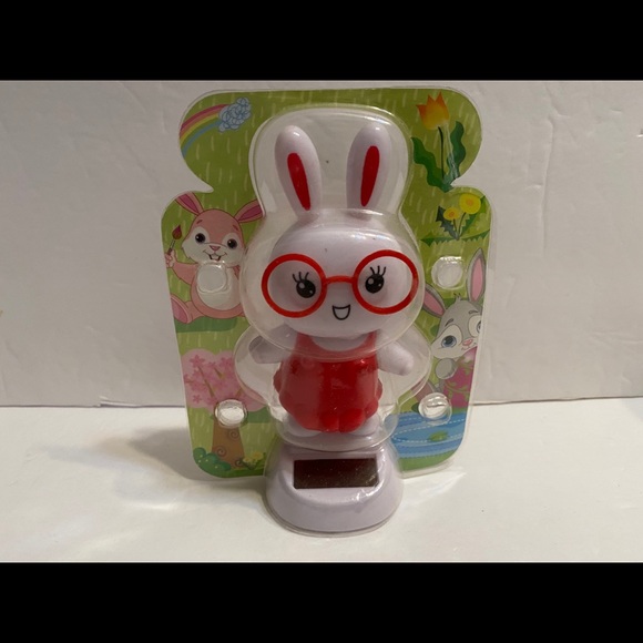Solar Powered dancing red rabbit w/glasses figuire